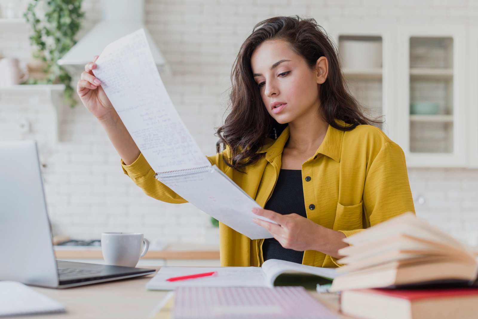 a female looking at organising her paperwork and to do tasks